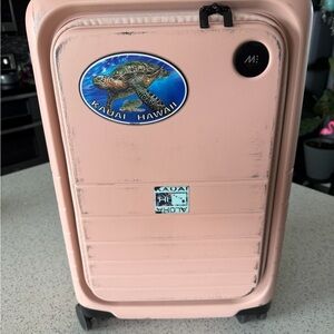 Pink Suitcase with Kauai Hawaii Sticker